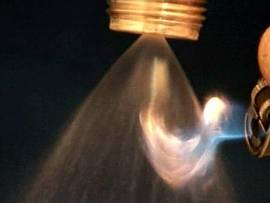 www.H2O-Consult.de - Implosionsprinzip - Wirbler saugt Gasflamme durch Wasserkaskade nach innen